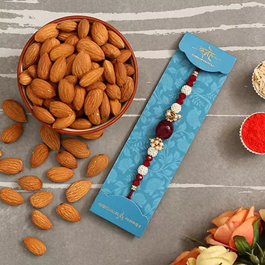 Rakhi - Red Beads Pearl Designer Rakhi And Healthy Almonds