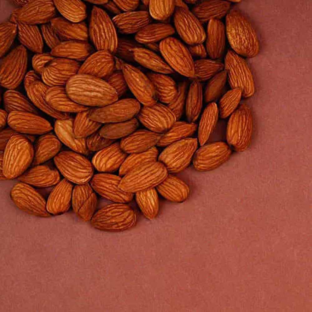 Rakhi - Red Beads Pearl Designer Rakhi And Healthy Almonds
